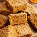 Several slices of pumpkin coffee cake.