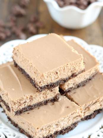 These Skinny Mocha Cheesecake Bars are lightened up with Greek yogurt and less sugar! Serve these bars for an easy and lighter dessert.